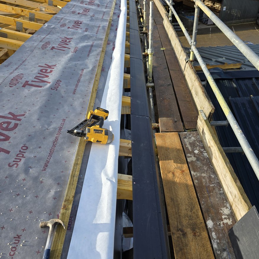 “Commencement of a new slate roof covering.”