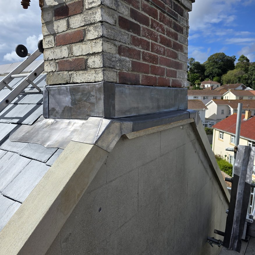“Lead detailing to the heritage chimney, fully completed with two coats of patination oil.”